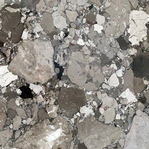 Gray and white marble with irregular patterns, suitable for a countertop or flooring.