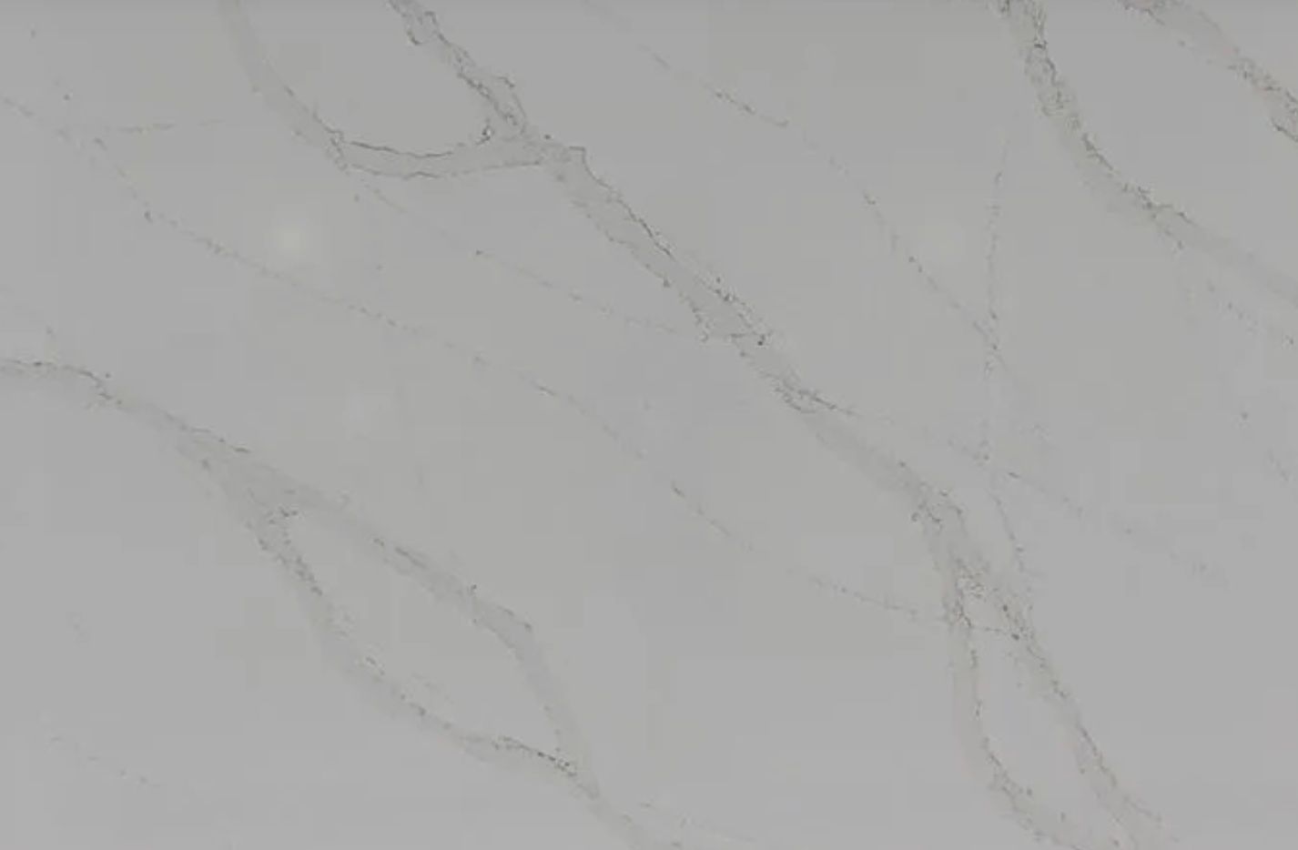 White countertop with gray veining.