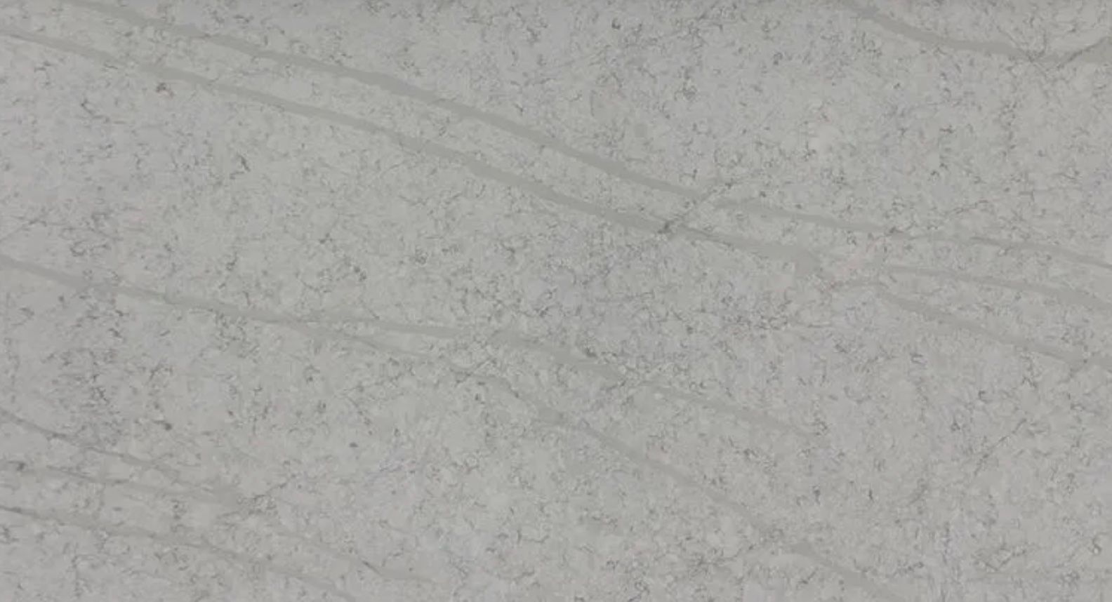 Gray surface with subtle, light-colored curved lines.