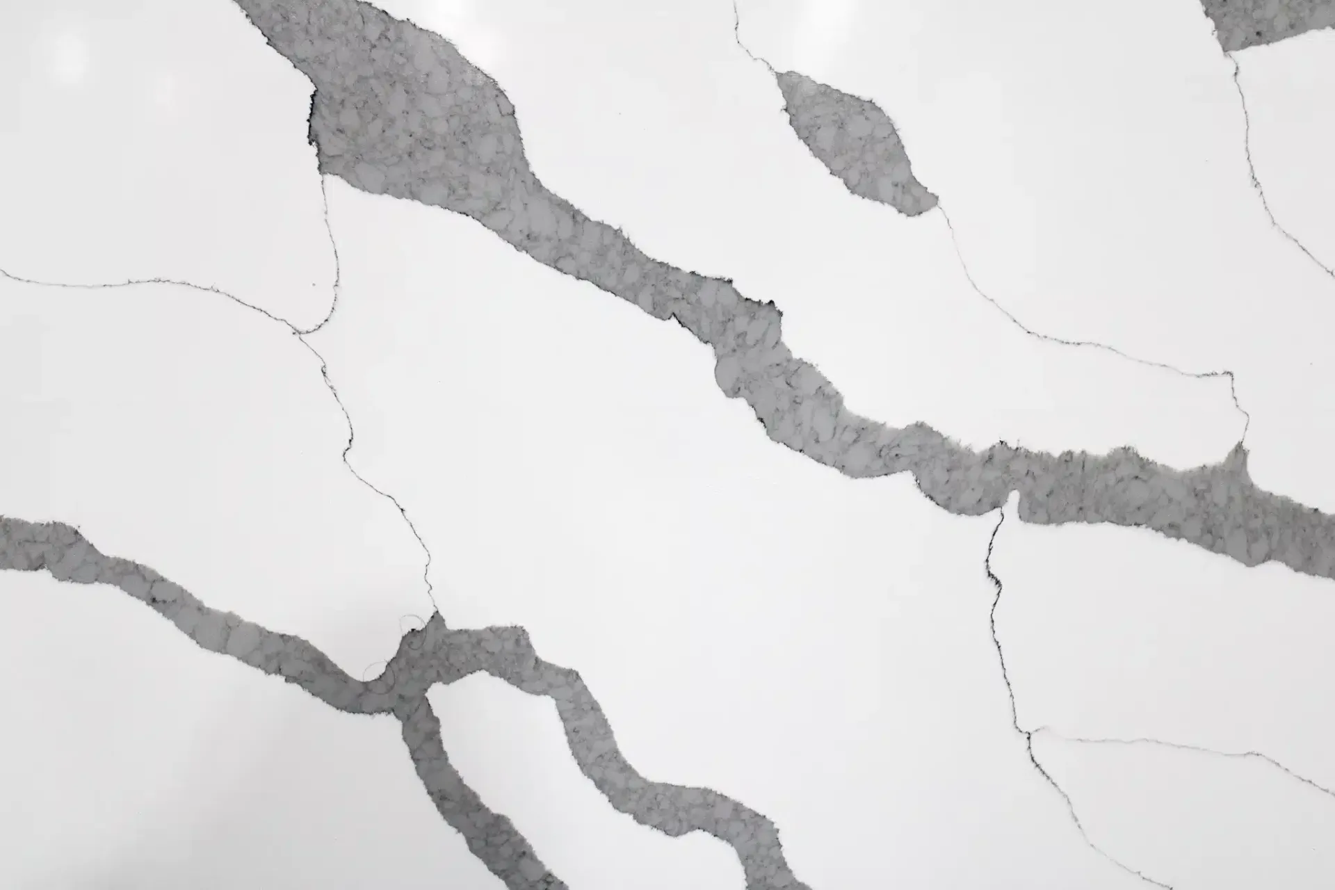 White countertop with gray veining.