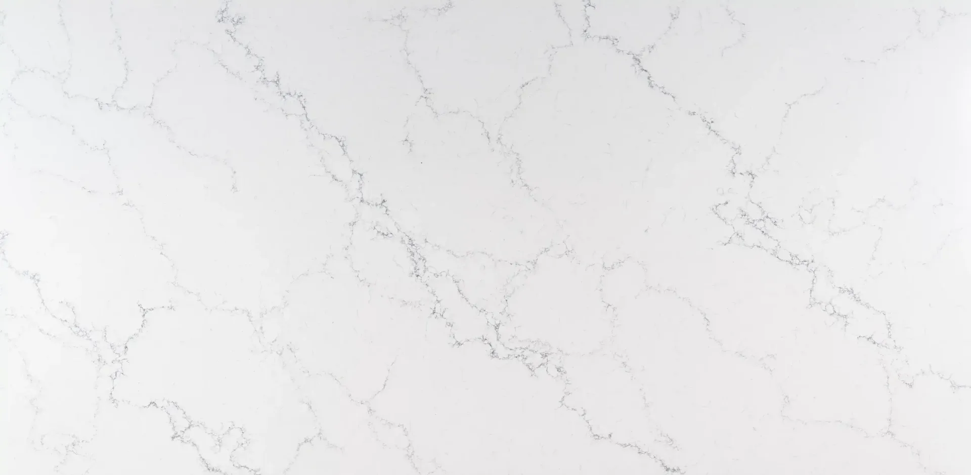 White marble surface with gray veining.