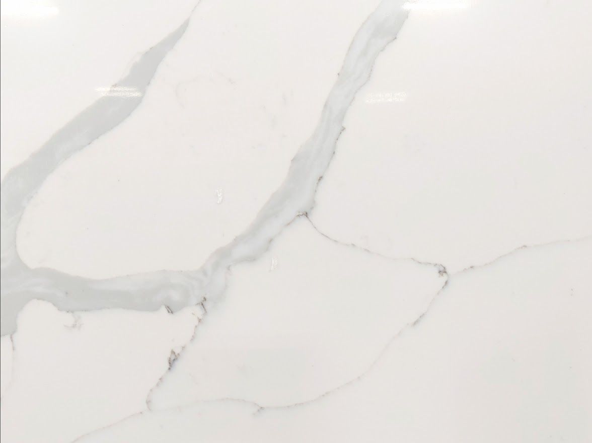 White countertop with gray veining.