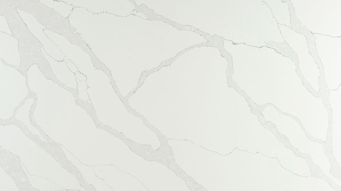 White countertop with gray veining.