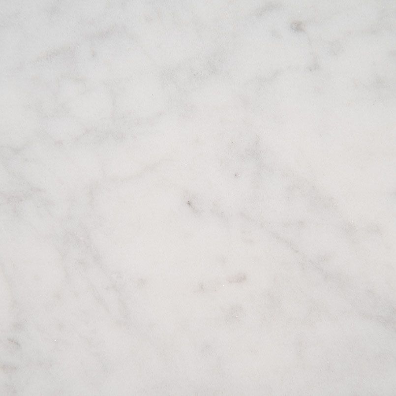 White marble surface with gray veining.