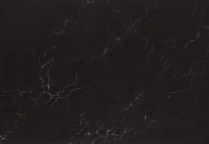 Black countertop with white veining pattern.