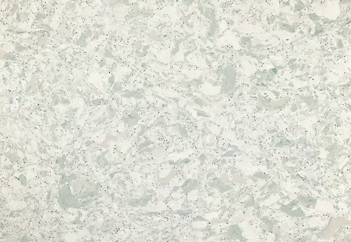 White and light blue speckled countertop surface with organic, marble-like patterns.