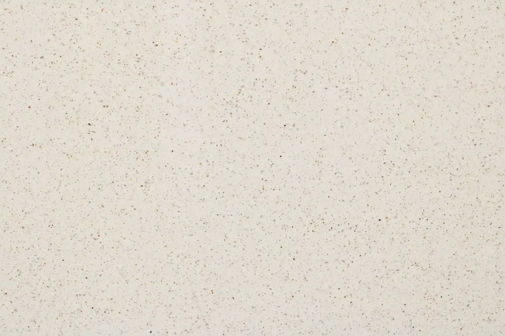 Off-white, speckled stone surface with tiny brown flecks.