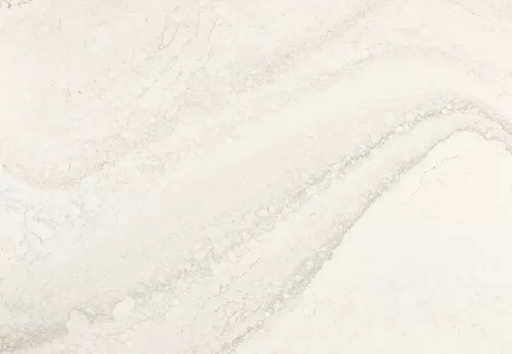Cream-colored marble with subtle gray veining, creating a flowing, wavy pattern.