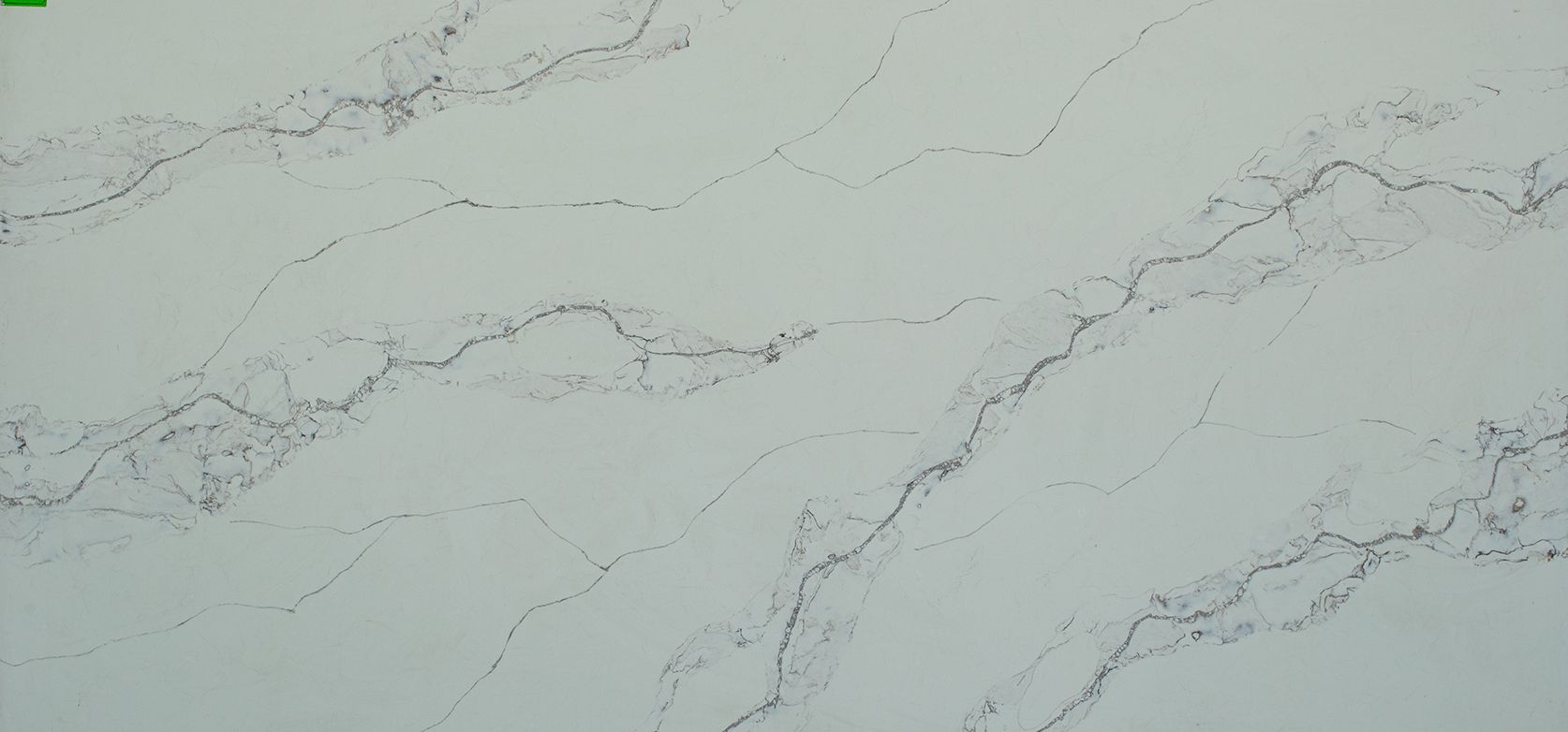 White countertop with grey veining.