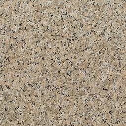 Tan granite surface with black and white flecks.