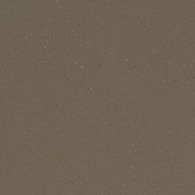 Brown, textured surface with subtle light speckles.