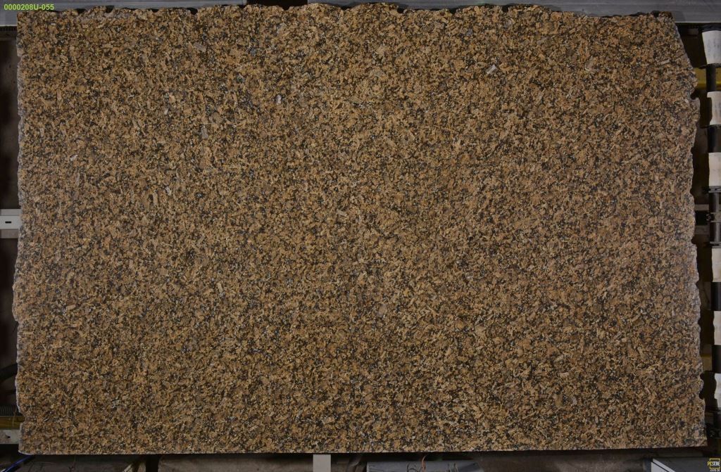 Tan granite slab with rough, textured surface.