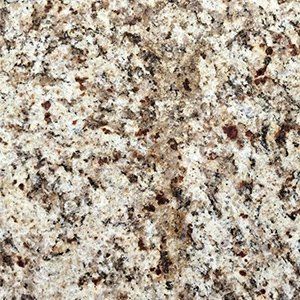Granite countertop with speckled beige, white, and brown pattern.