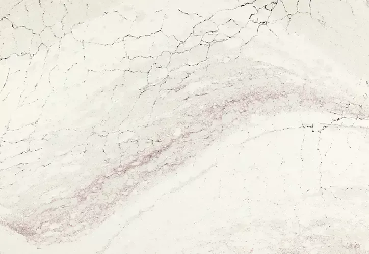 White marble surface with gray and pink veining.