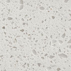 White quartz countertop with a speckled pattern.