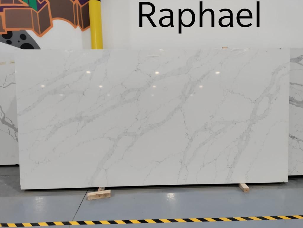 Large white marble slab with gray veining; labeled 