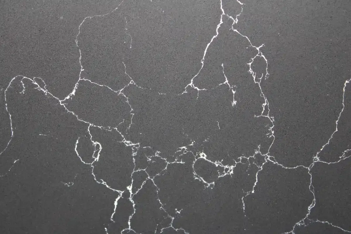 Dark gray countertop with white veining.