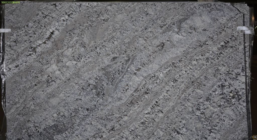 Gray granite slab with white and black flecks.