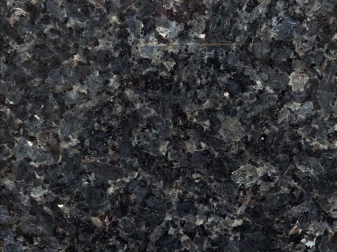 Dark blue granite countertop with a speckled pattern.