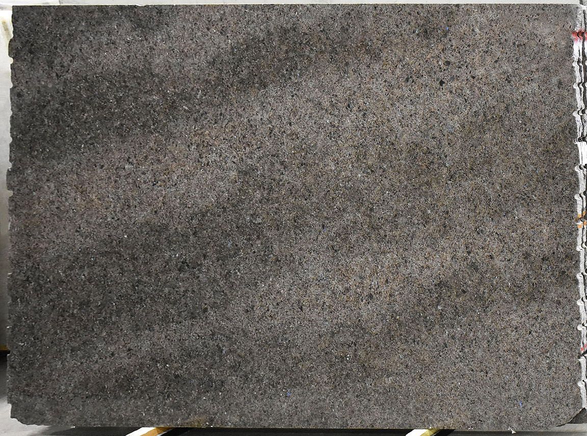 Dark gray granite slab with speckled texture, likely for a countertop or surface.