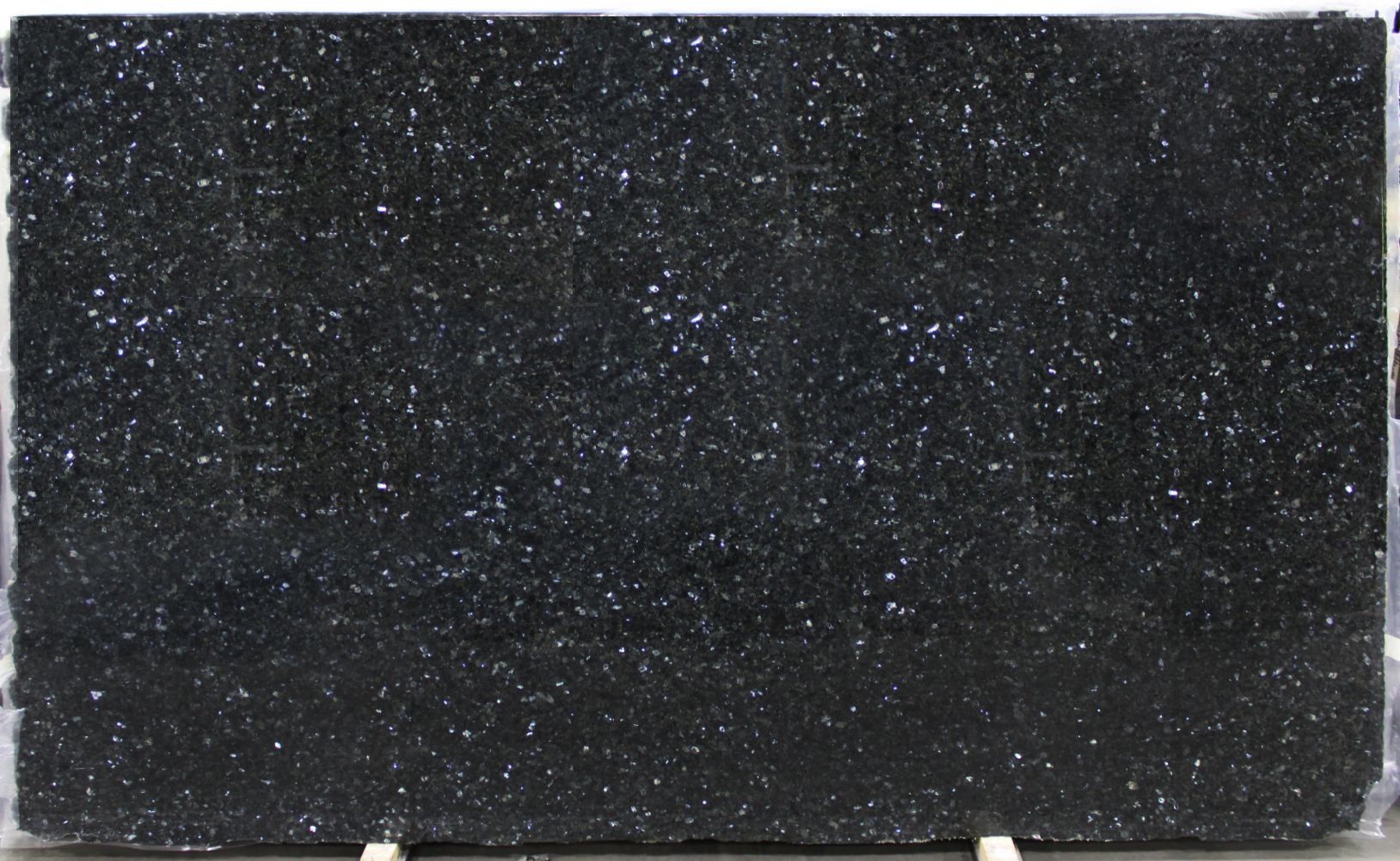 Black granite slab with sparkling specks.