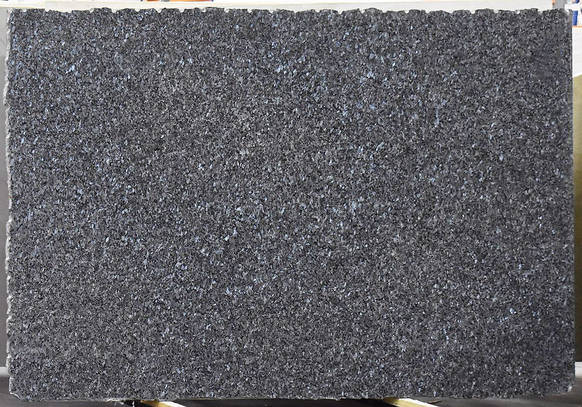 Dark gray granite slab with a rough texture, possibly for countertops or flooring.