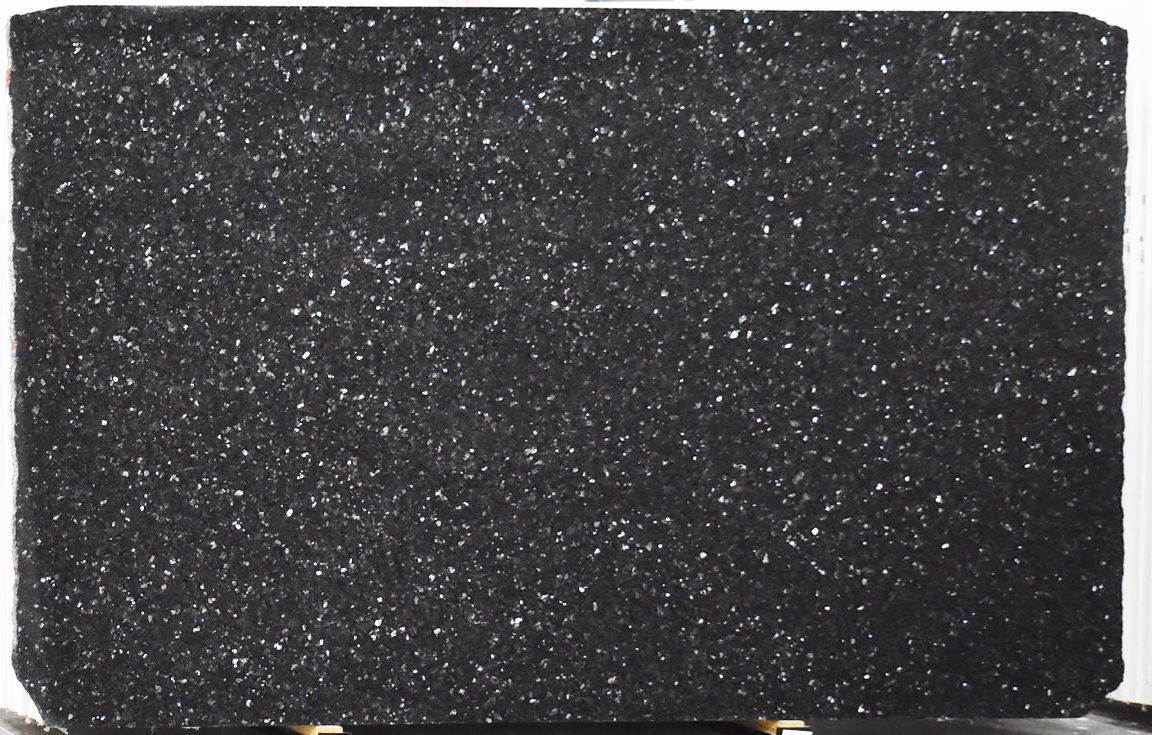 Black granite slab with sparkling mineral inclusions.