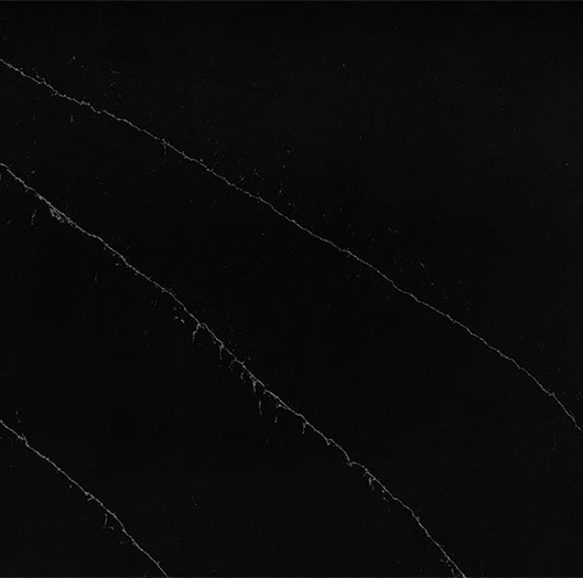 Black marble surface with white veining.