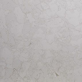 White quartz countertop with cloudy veining.