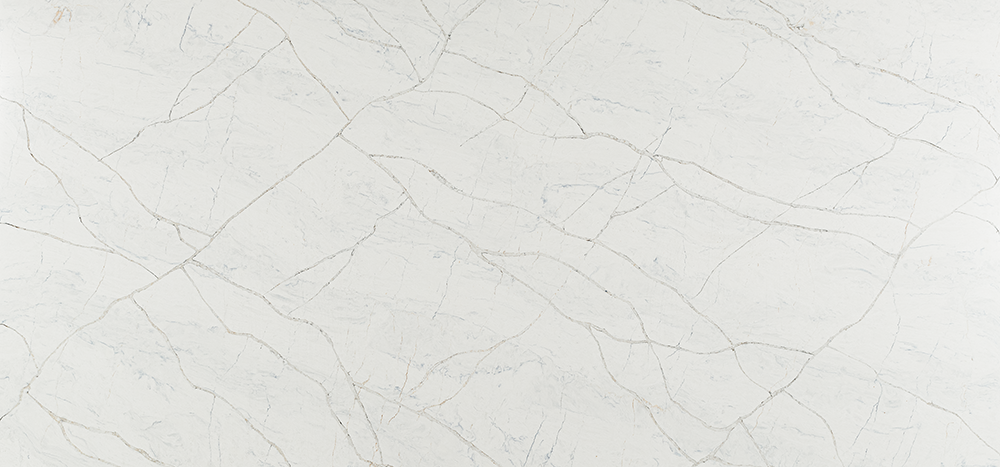 White marble with gray veining and cracks.