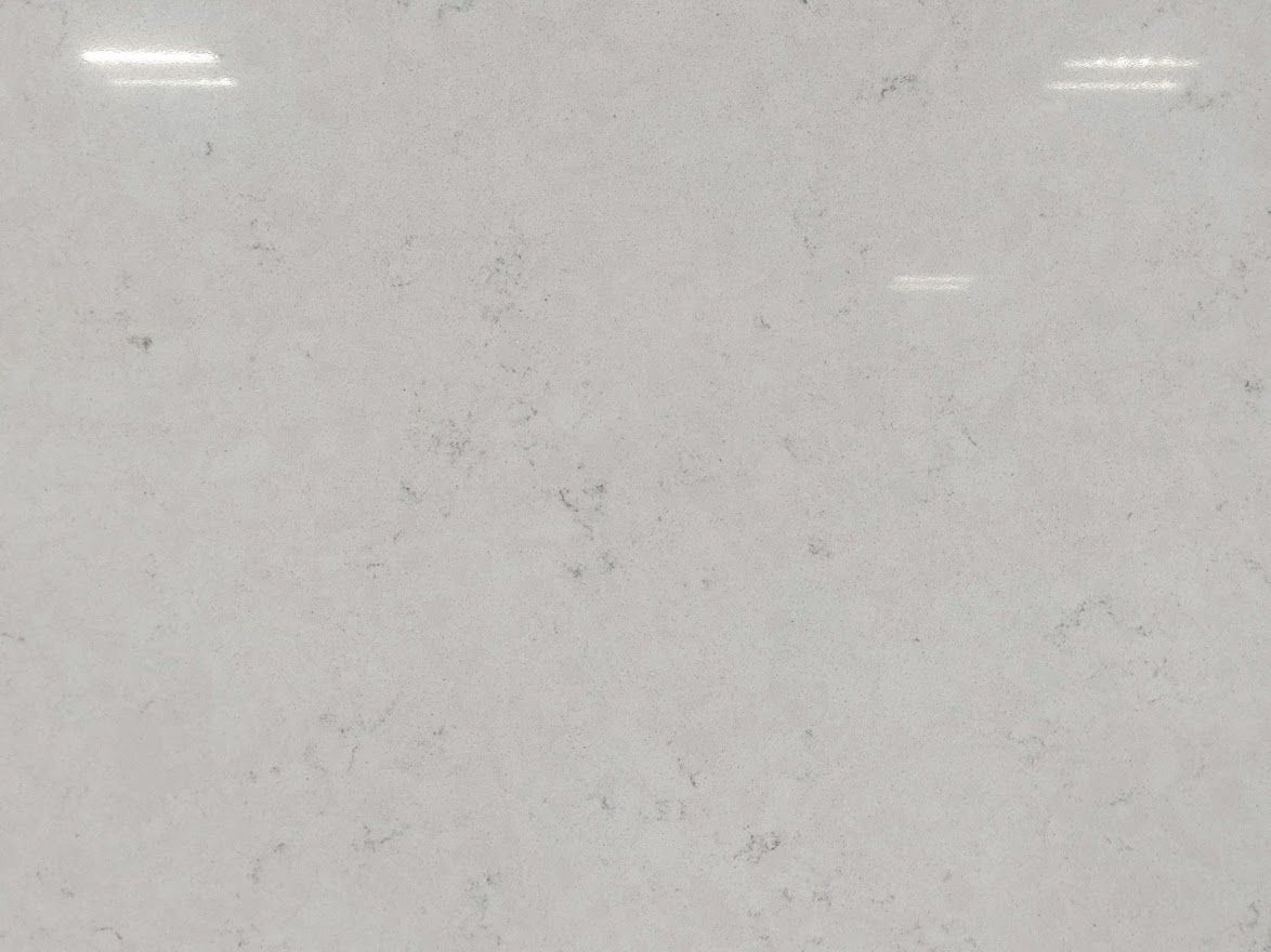 Light gray countertop with subtle veining and a glossy finish.