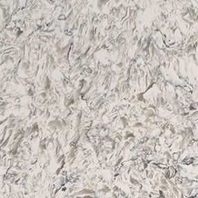 White quartz countertop with swirling patterns and subtle gray veining.