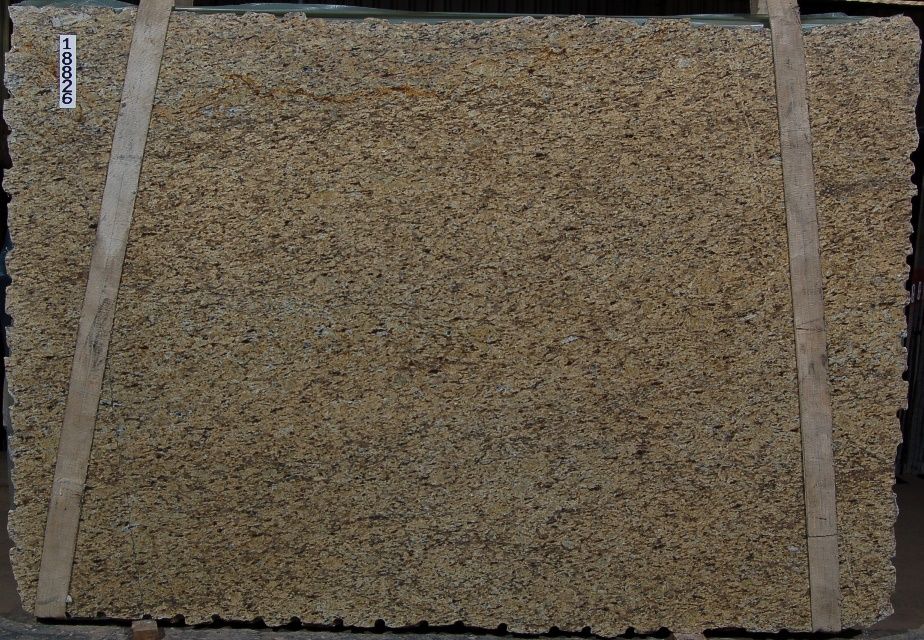 Tan granite slab with wood strapping.