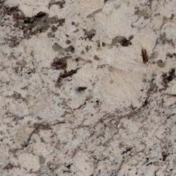 Close-up of granite with beige, white, gray, and brown speckled patterns.