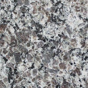 Gray, white, and black speckled granite surface.
