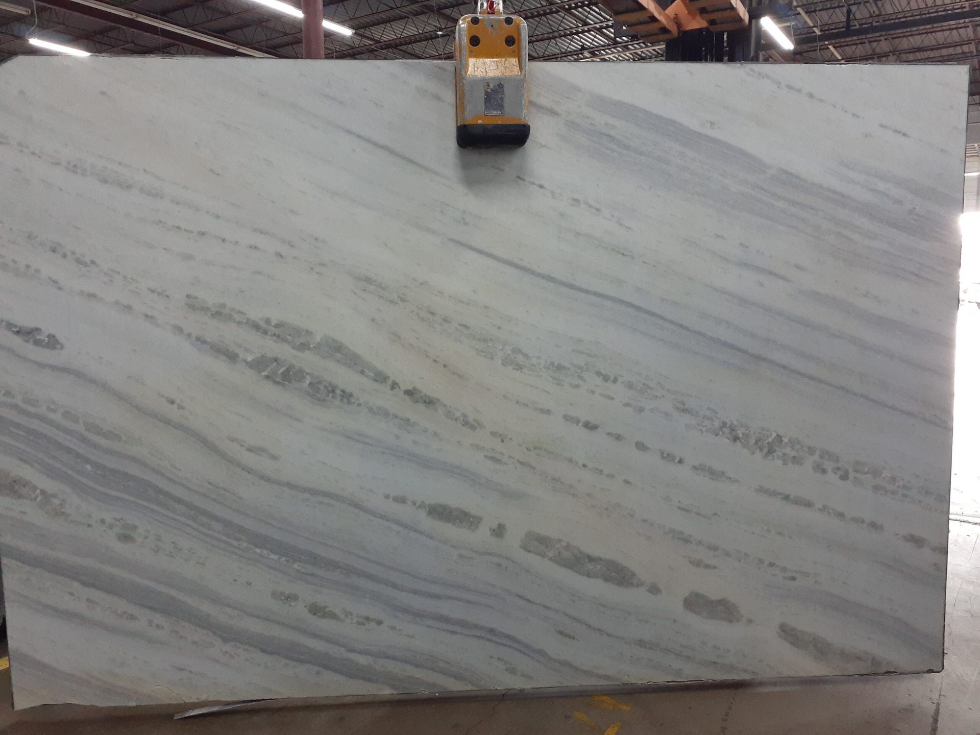 Large marble slab with blue and gray veining.