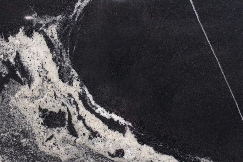 Black granite with white and gray veining.
