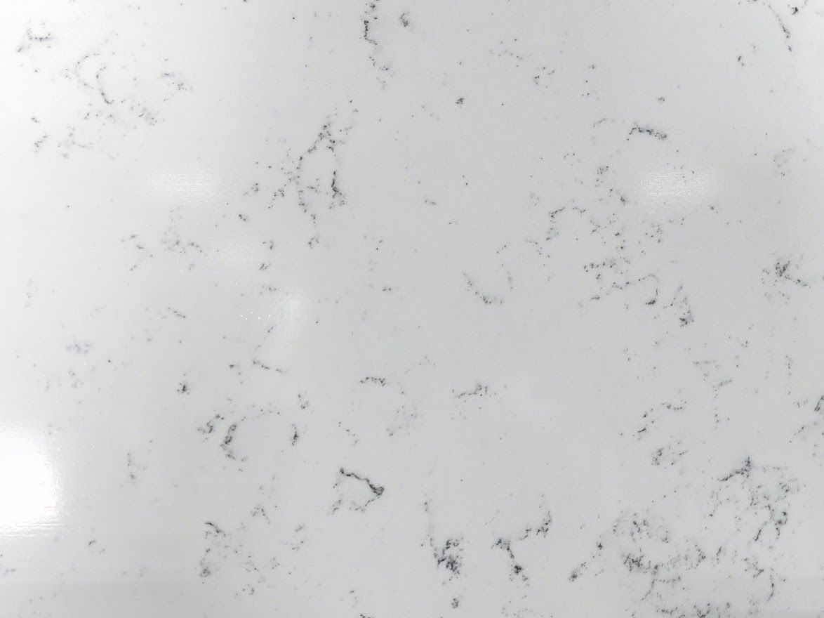 White countertop with gray veining.