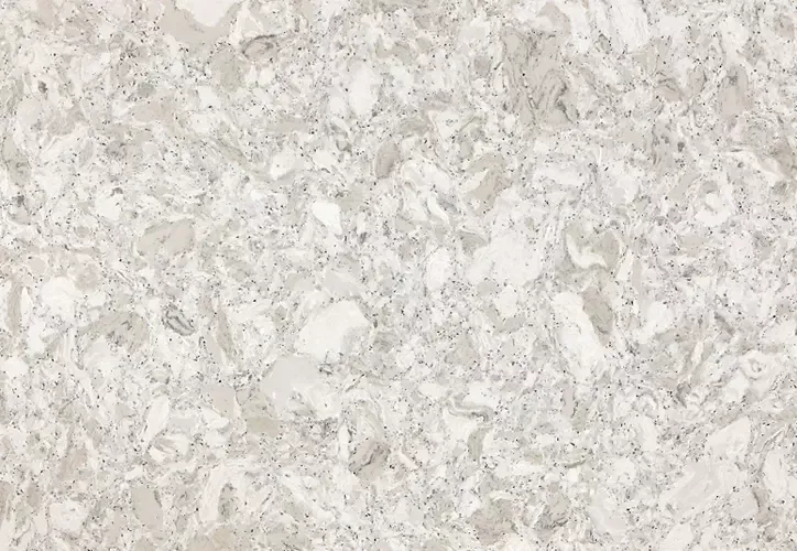 Light grey quartz countertop with a speckled pattern.
