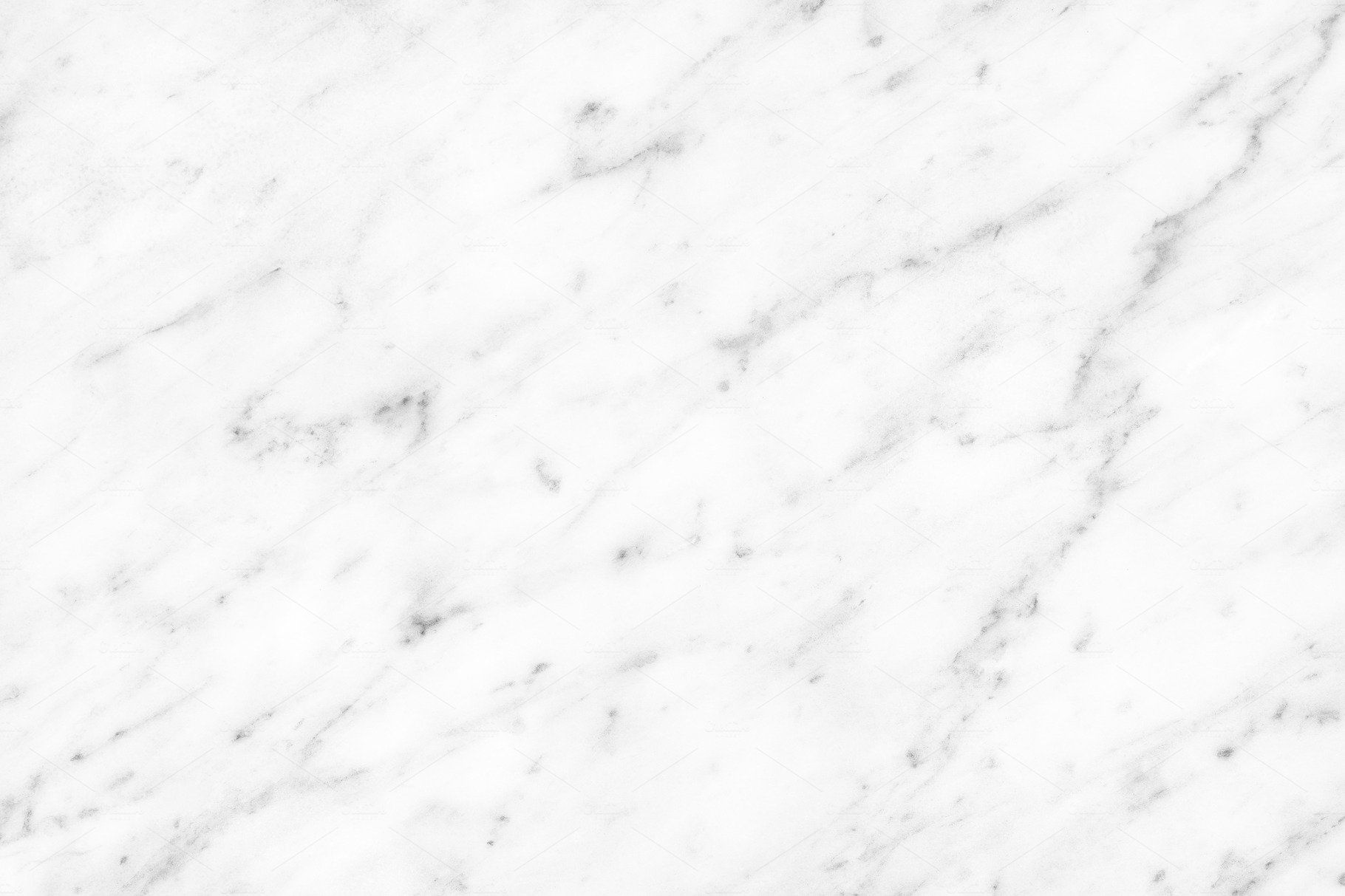 White marble with grey veining.