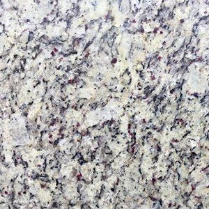 White granite countertop with gray and red flecks.
