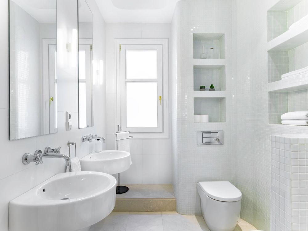 A Bathroom With Two Sinks, a Toilet and a Window — Dimond J Carpentry in Nambour, QLD