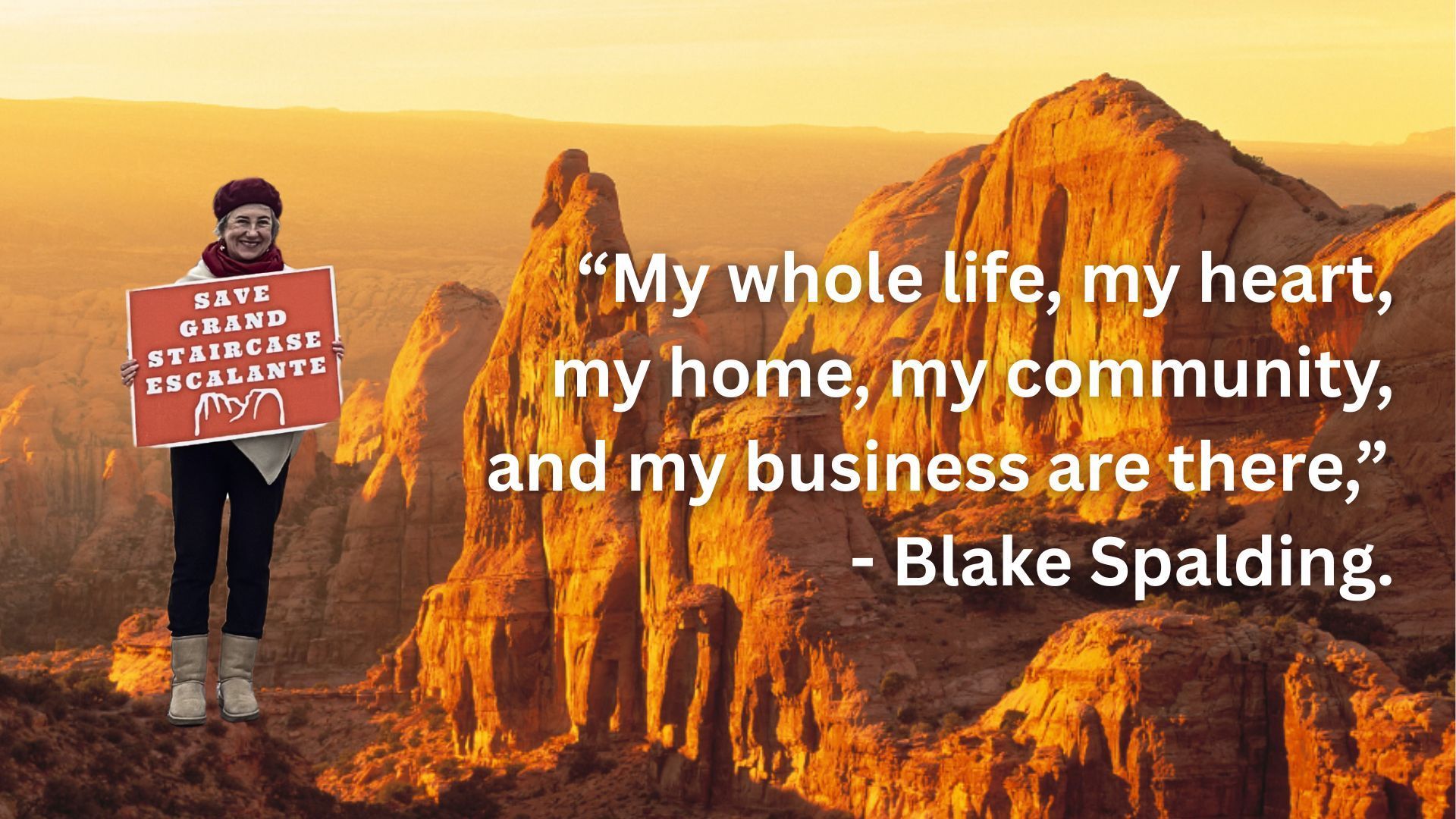 Golden glow from the sun on giant rock formations in the desert with a person holding a sign that says 