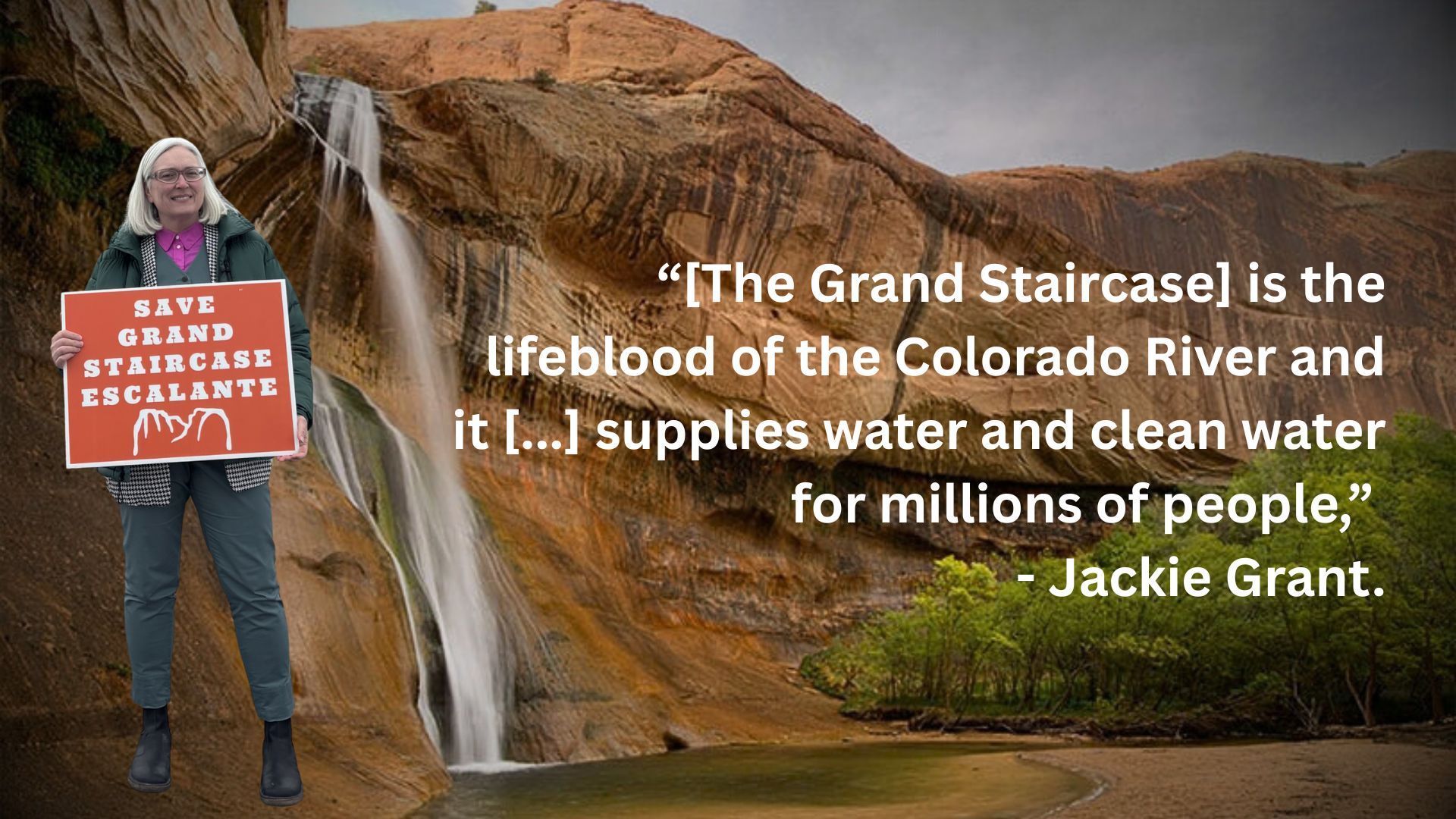 Waterfall in rock canyon with person holding a sign that says 