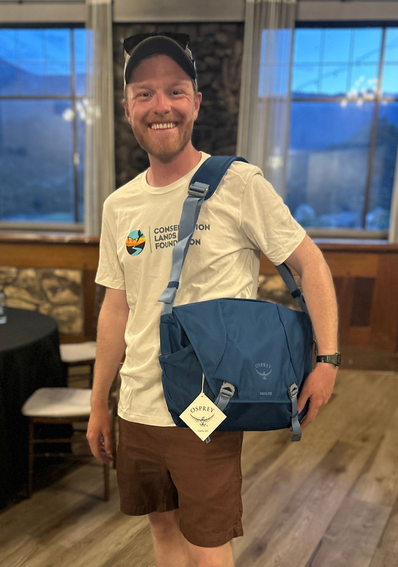 Person holding an Osprey bag