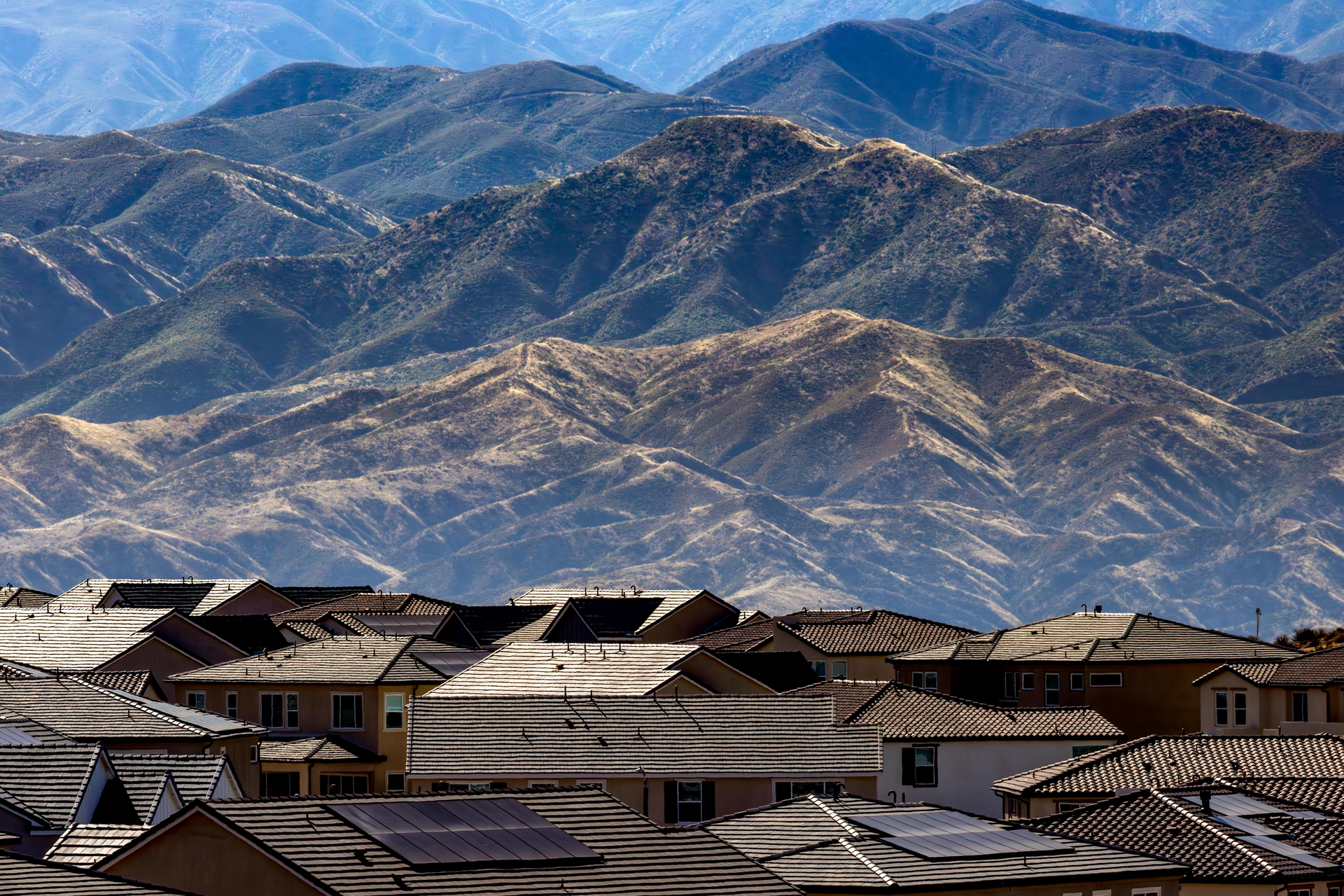 Housing with mountains behind