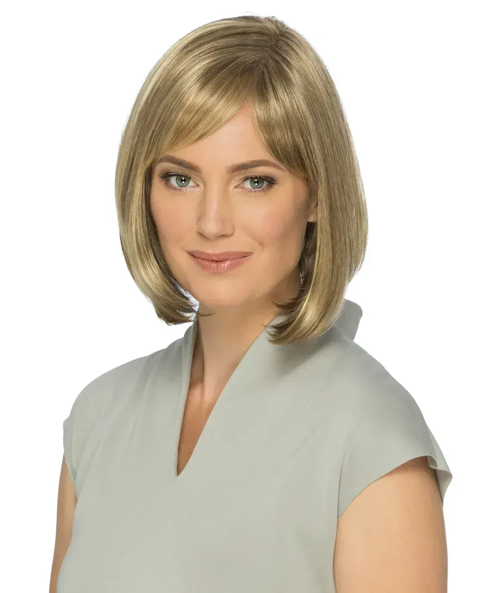 A woman wearing a wig and a grey shirt