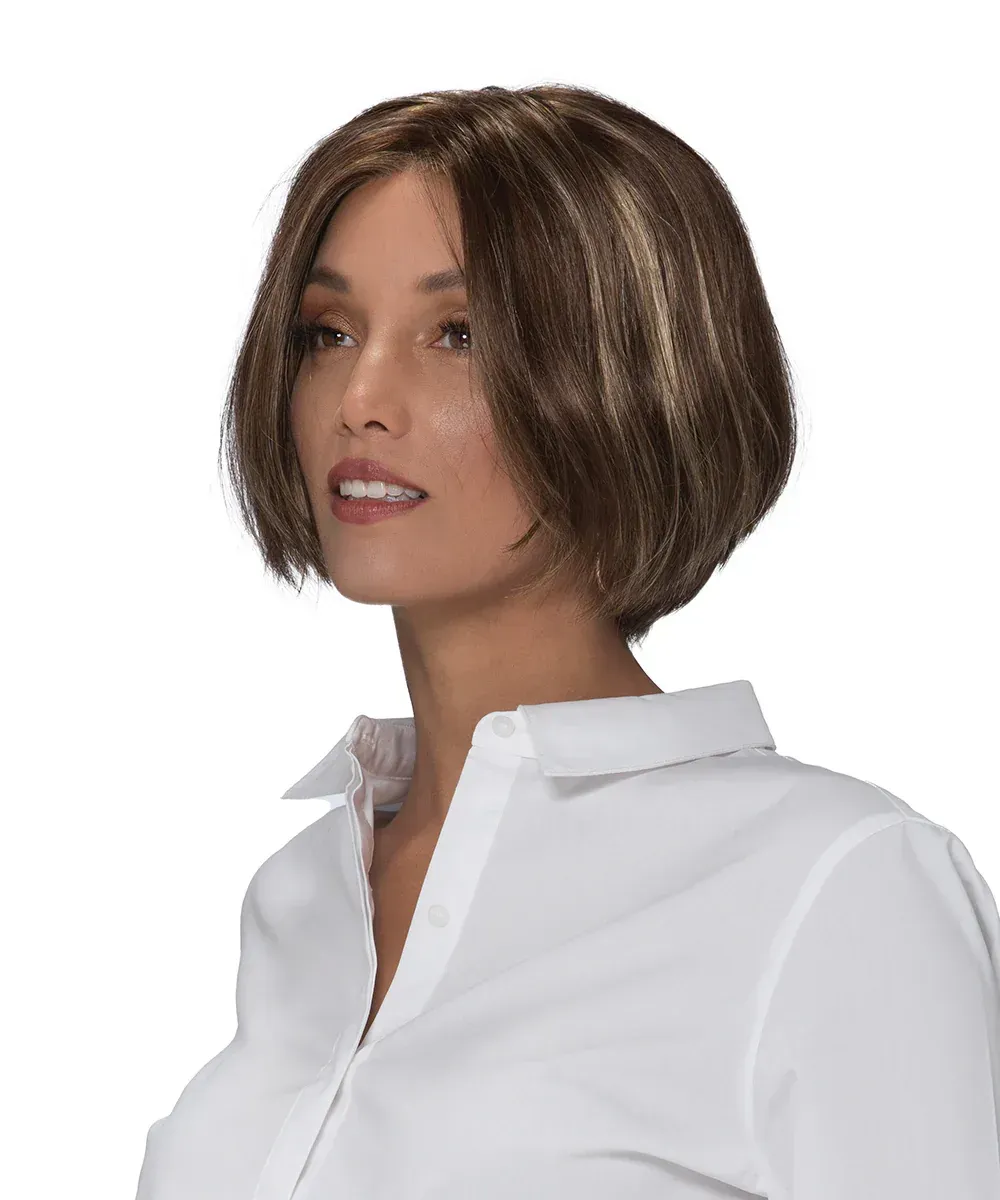 A woman wearing a wig and a white shirt