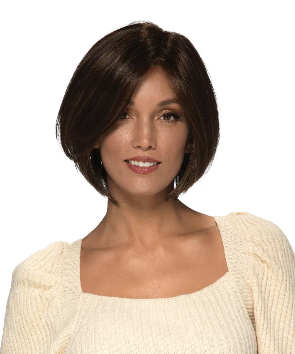 A woman wearing a wig and a white sweater