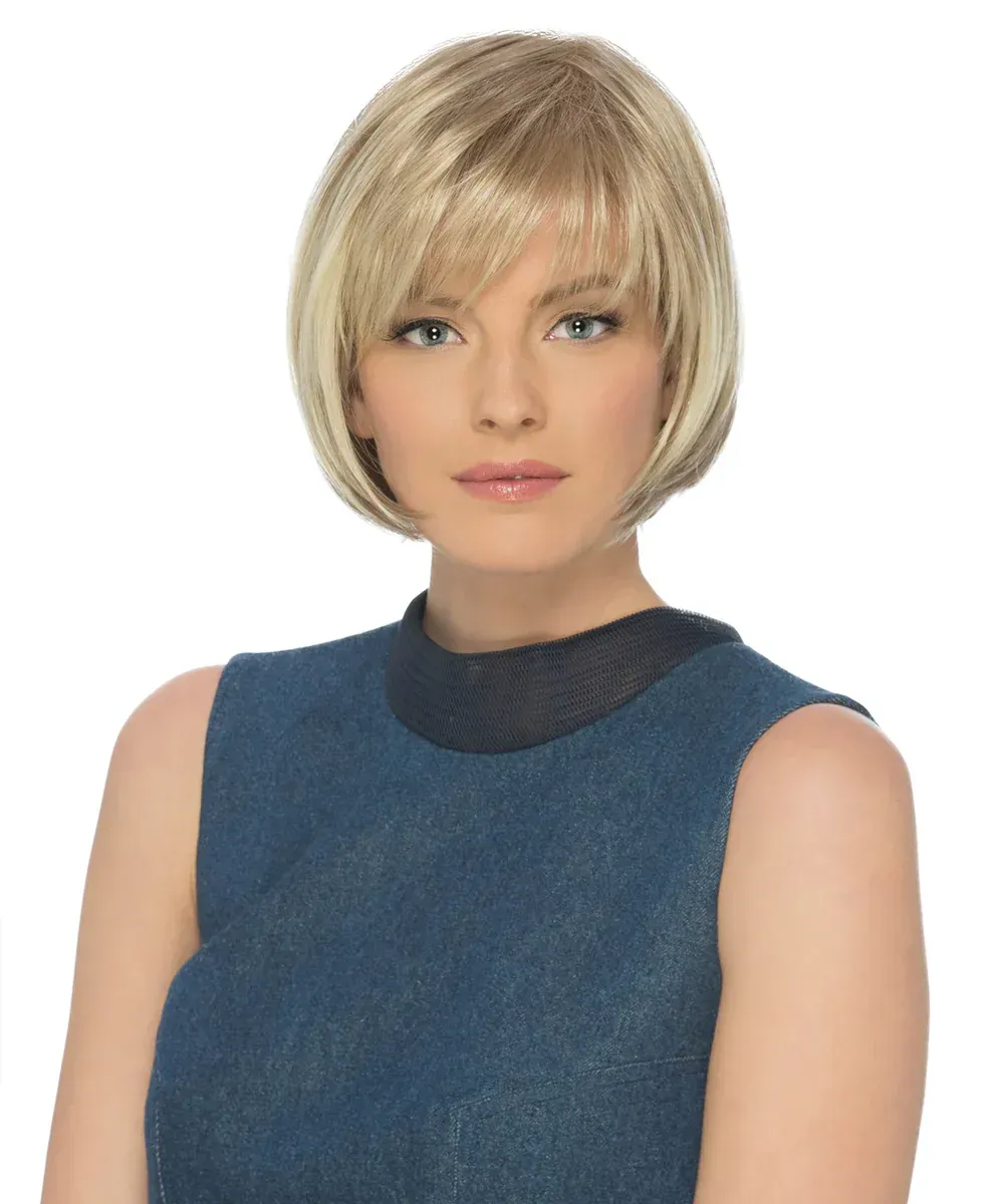 A woman wearing a wig and a blue dress